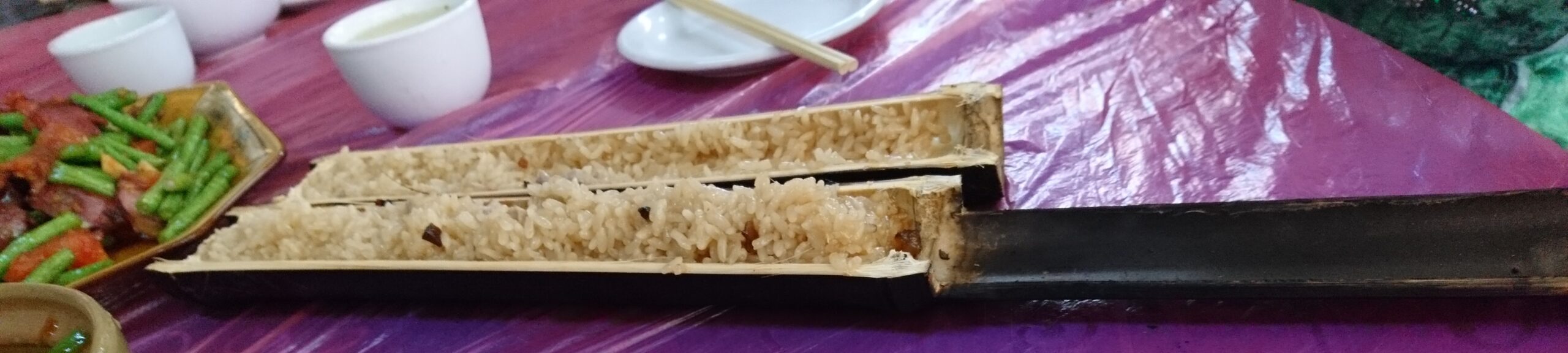 Cooking rice in bamboo